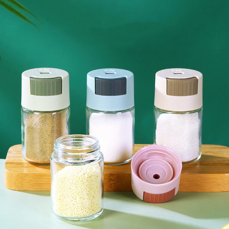 Kitchen storage control metered 100ml glass spice shaker jars with pressing caps