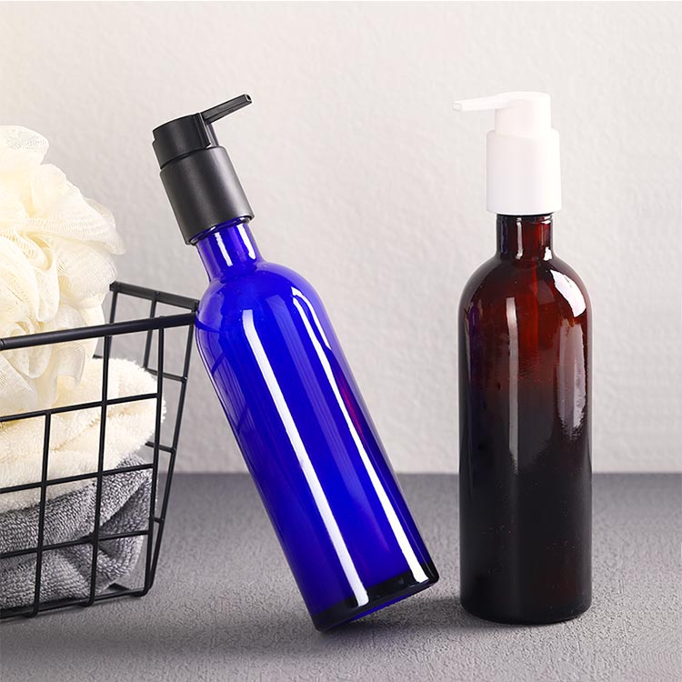 Wholesale 200ml amber/blue glass lotion bottle with pump and clip