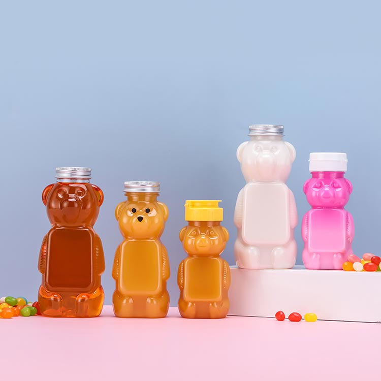 Wholesale custom size clear 250ml PET plastic bear juice bottles with caps