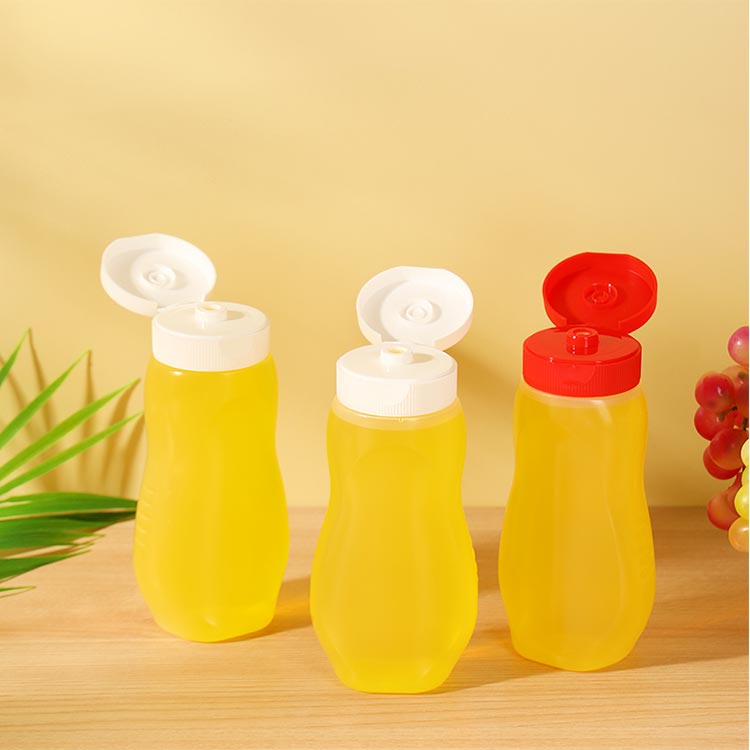 Food grade clear 330ml squeeze pet plastic honey bottles with flip top caps