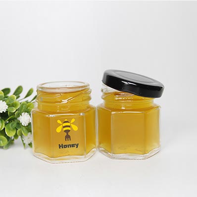 Hot selling clear 16oz  glass hexagon jars with gold twist off lids