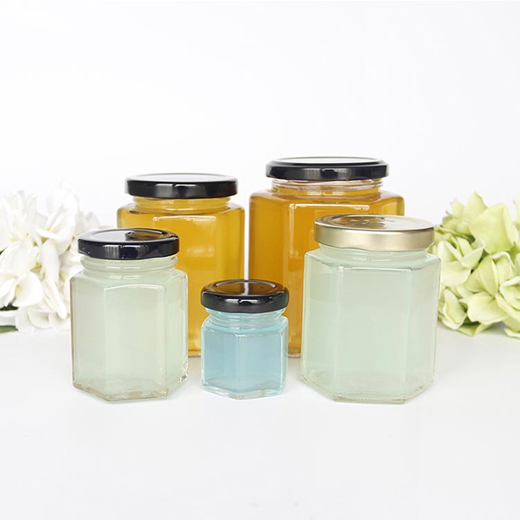 Hot selling clear 16oz  glass hexagon jars with gold twist off lids