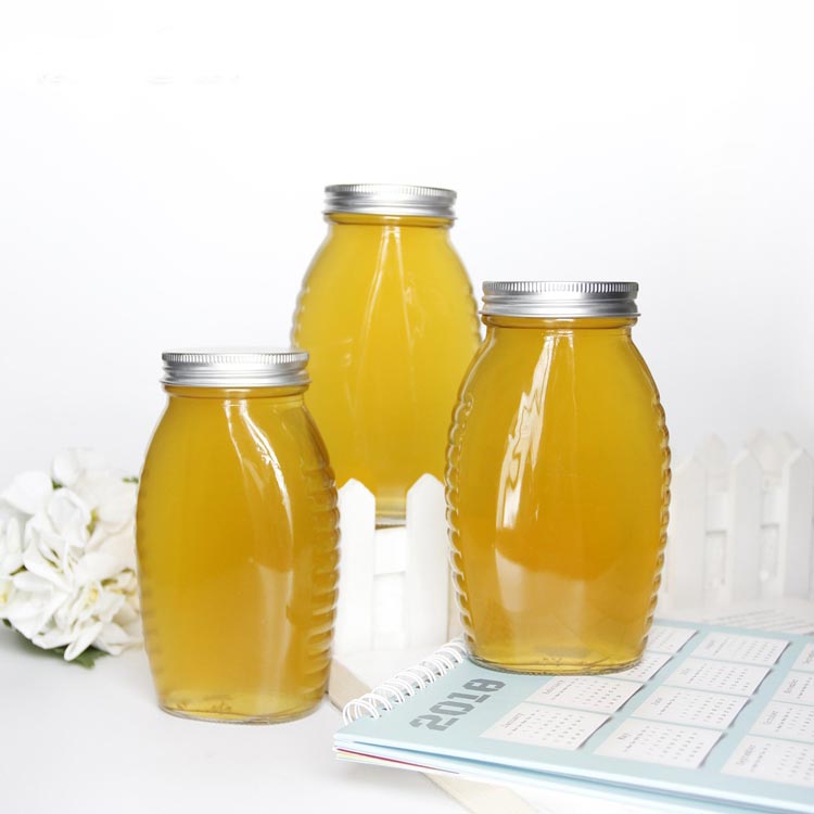 Manufacturer empty 500ml glass honey jar with dipper bulk