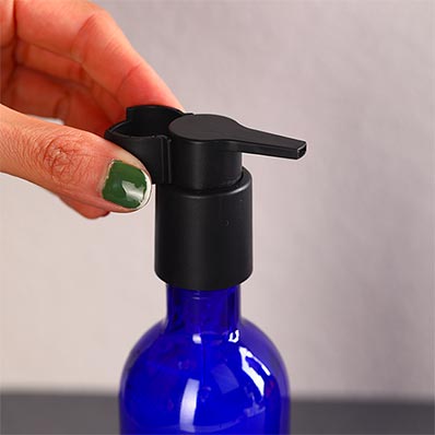 Wholesale 200ml amber/blue glass lotion bottle with pump and clip