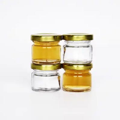 High quality clear 15ml 20ml glass mini honey jars with metal screw lids