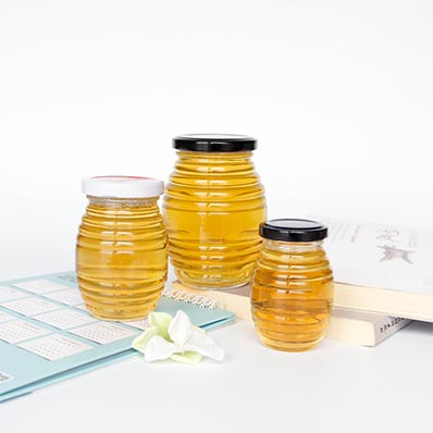 Food grade 16oz glass queenline honey jars with lids from jar supplier