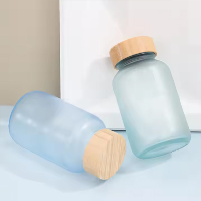 Wholesale 200ml matte blue glass vitamin supplement bottle luxury pill capsules bottle gummy container with wooden lid