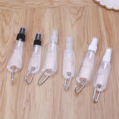 Travel size refillable 50ml plastic keychain bottles with flip top caps for lotions