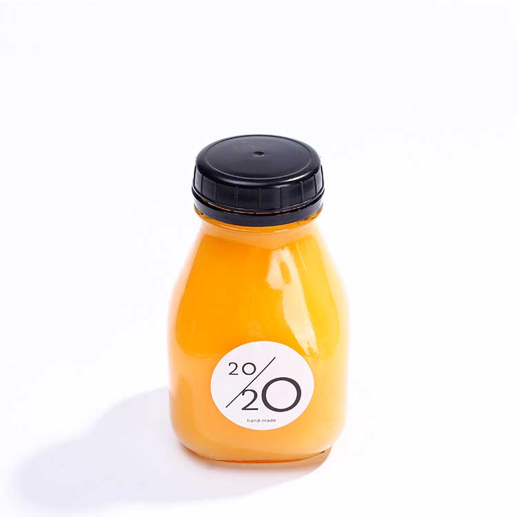 Empty transparent 16oz square glass juice bottle with tamper evident caps